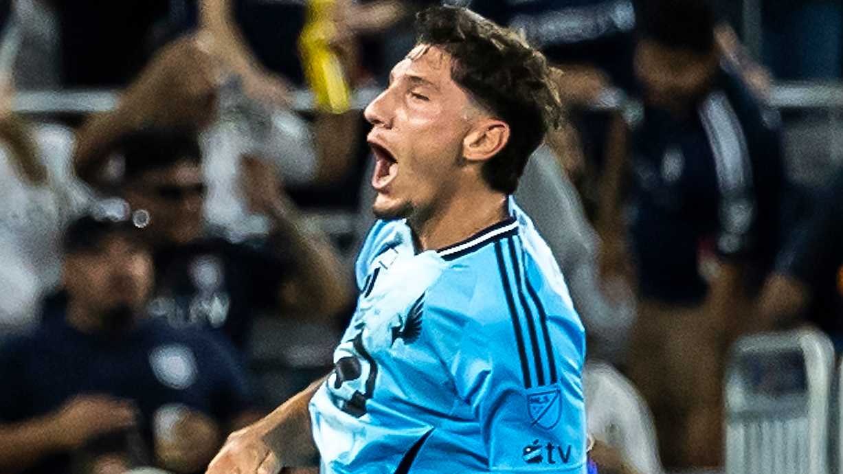 Denis Bouanga celebrating with teammates
