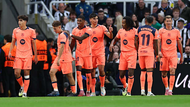 Marcus Rashford celebrates his first goal for Barcelona.