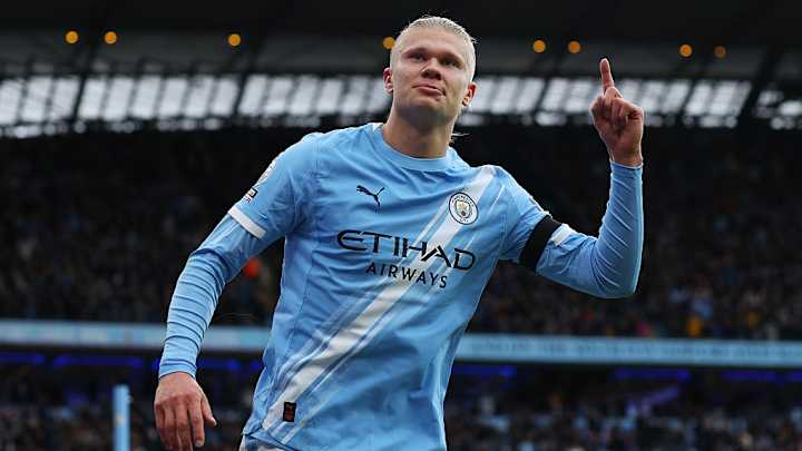 Erling Haaland celebrates a goal against Manchester United.