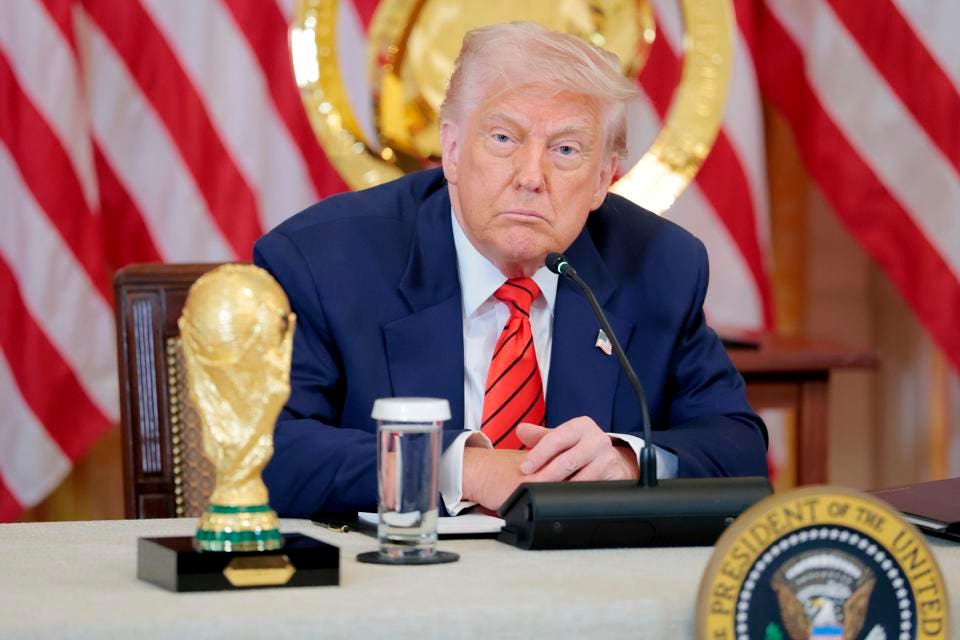 President Trump with the FIFA World Cup trophy