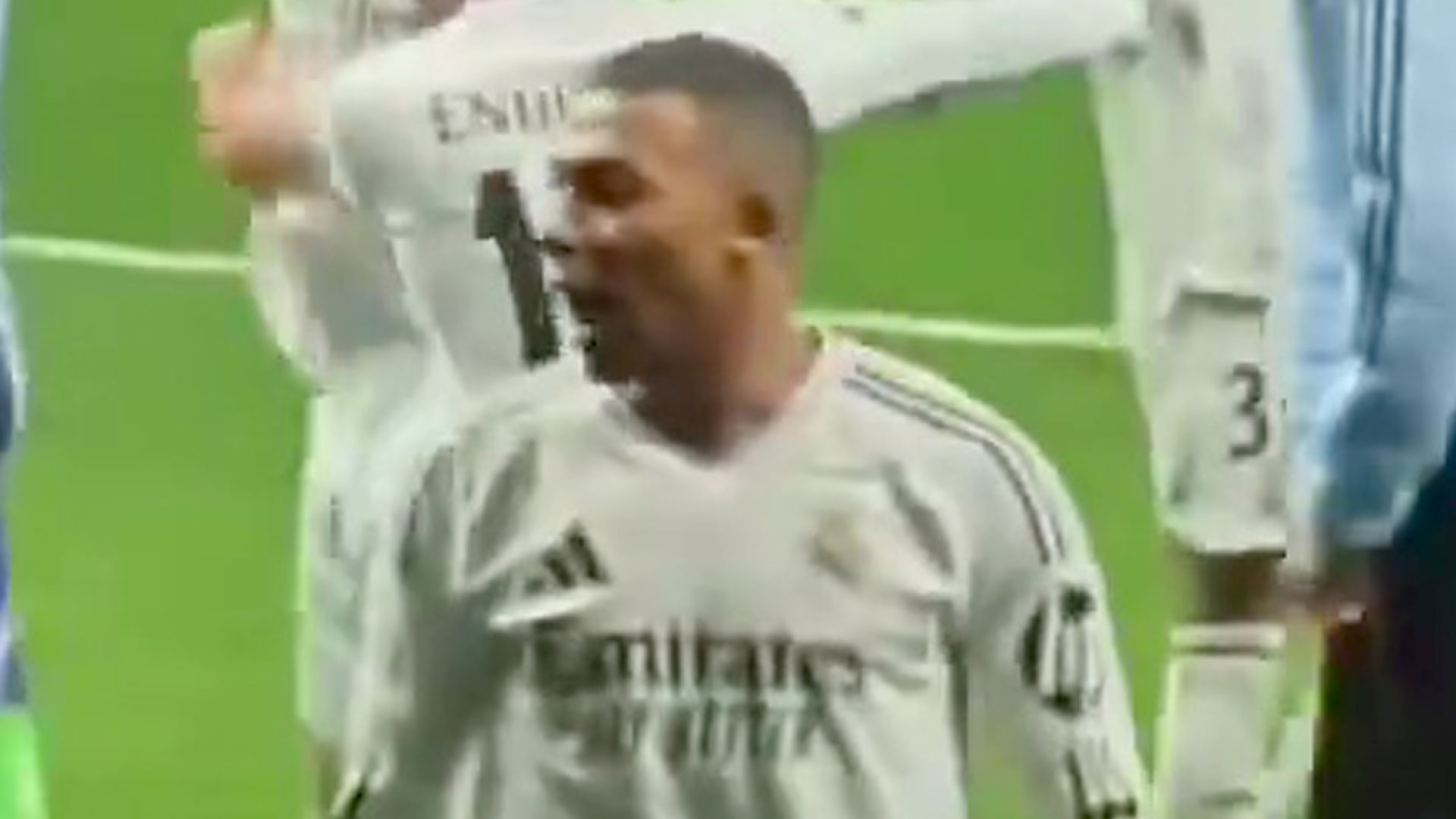 Kylian Mbappé making a gesture during a match.